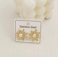 Gold sunburst stud earrings with white center stone - dorie jewelry
