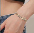 Triple row rhinestone bracelet gold tone - dorie jewelry